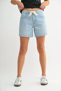 High rise lightweight tie waist denim shorts, back view