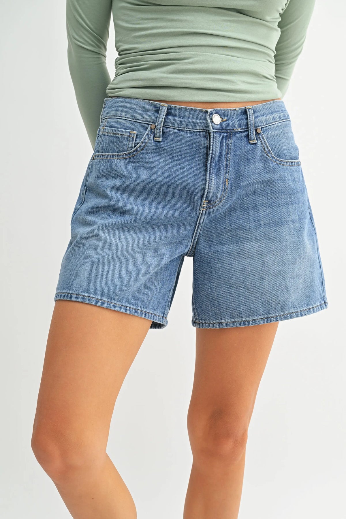High rise lightweight light-wash denim jean shorts with button closure and classic five-pocket design