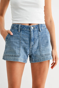High rise trouser denim short in light-wash with button closure