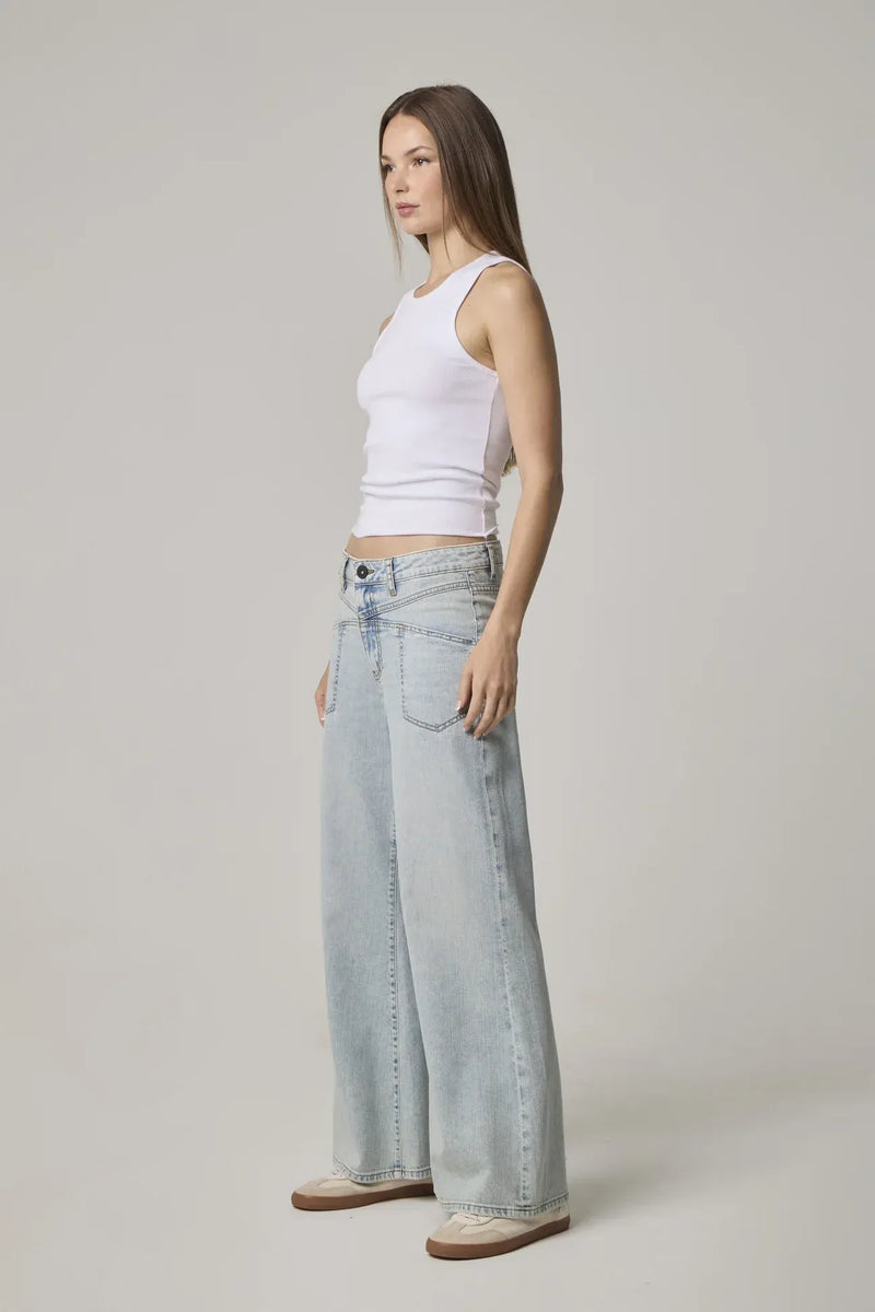 Edyson Cary light-wash denim jeans with a high rise wide leg fit and classic front and back yoke pockets
