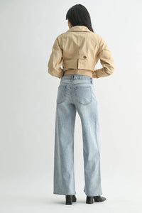 Light-wash high rise full length straight denim wide-leg jeans with classic back pockets shown from the back
