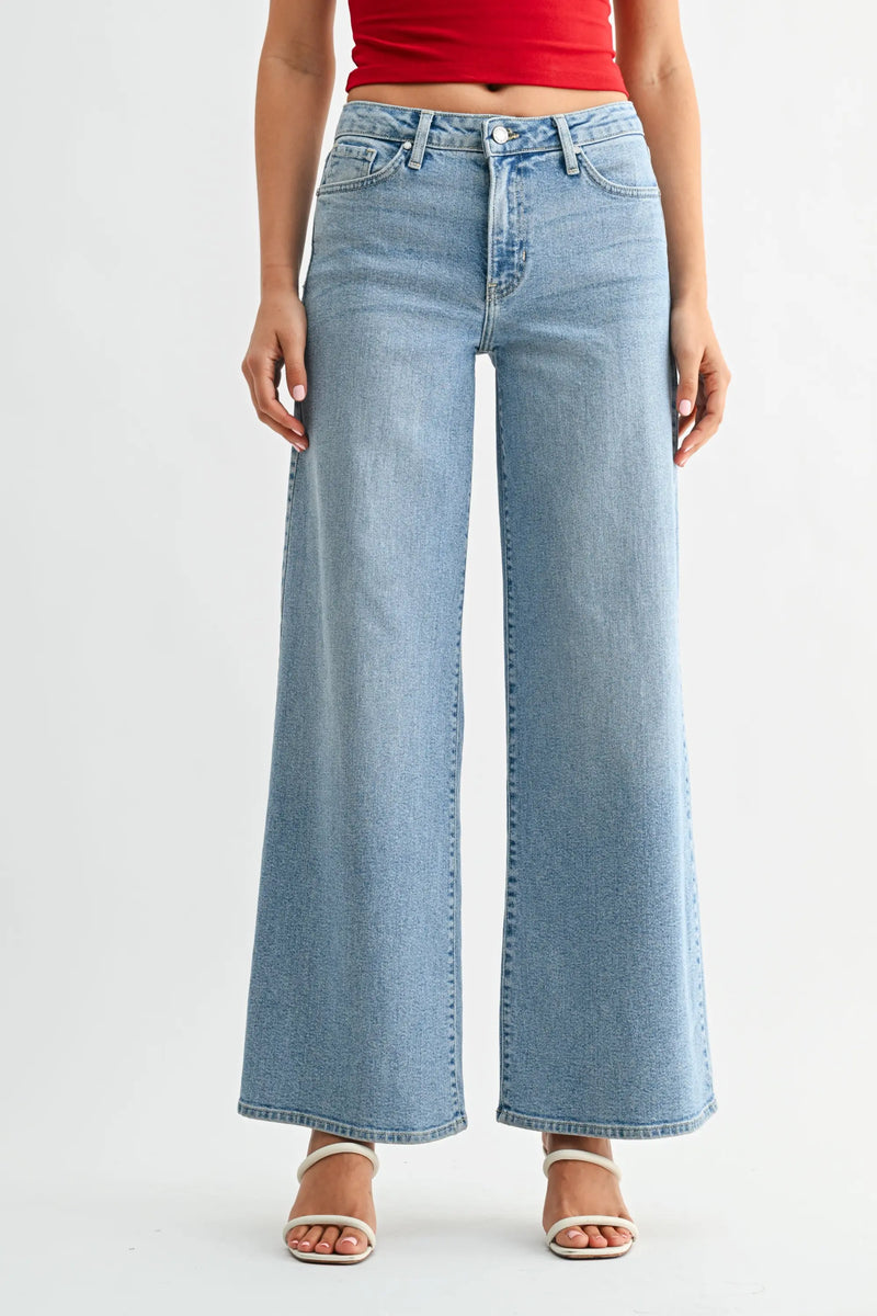 High-rise ultra wide-leg light-wash denim jeans with bohemian five-pocket design