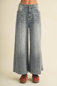 Light-wash vertical seam wide denim high-waist wide leg pants with visible stitching details