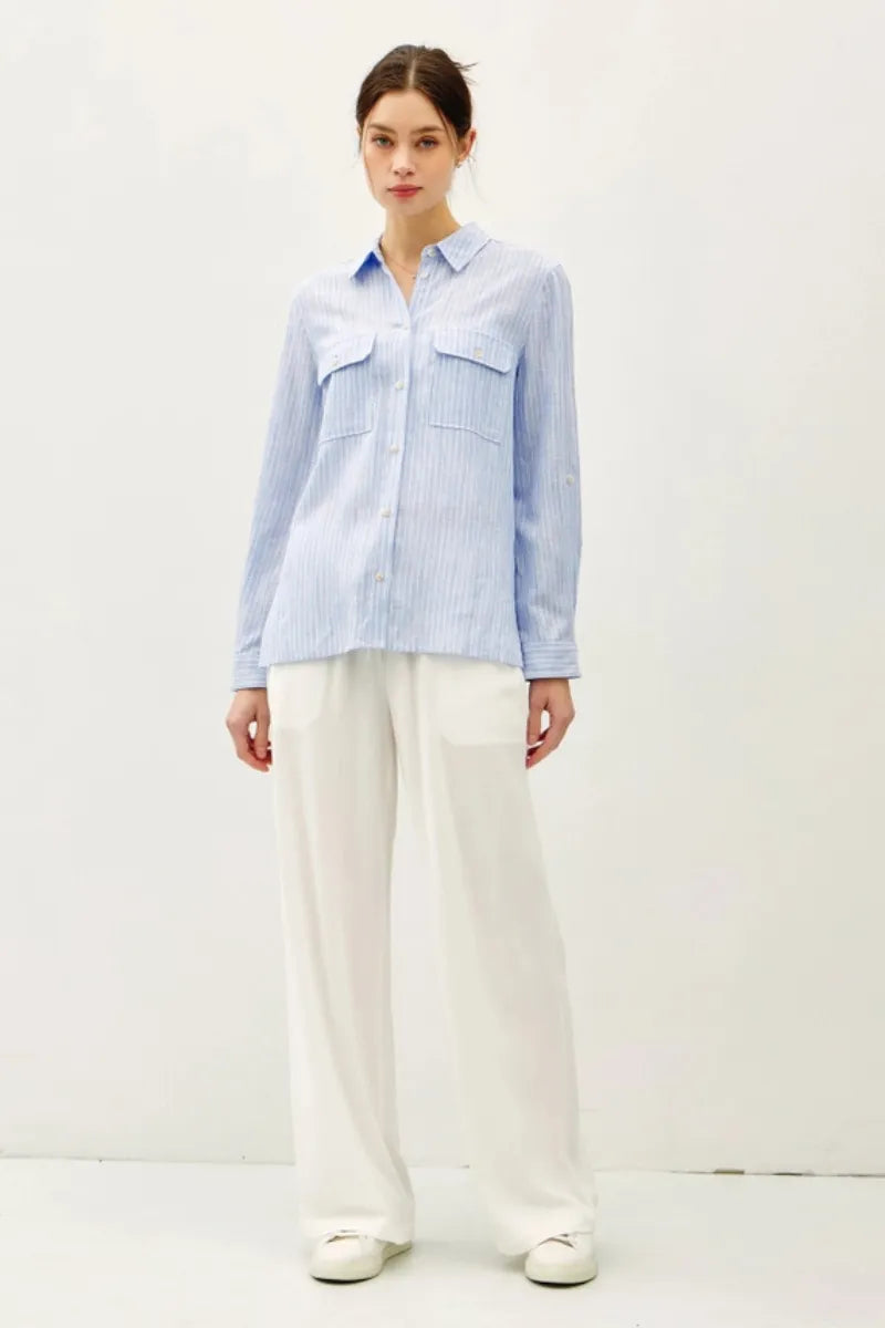 Light blue linen blend striped button up shirt with two chest pockets and a classic collar for casual wear