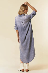 A long faded blue tencel denim shirt midi dress with rolled up sleeve tencel denim and relaxed fit