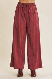 Maroon step washed wide leg pants with elastic waistband and drawstring for comfortable casual wear