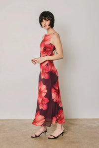 Flowing maxi dress in vibrant red floral mesh print on burgundy with delicate open back cut-out details