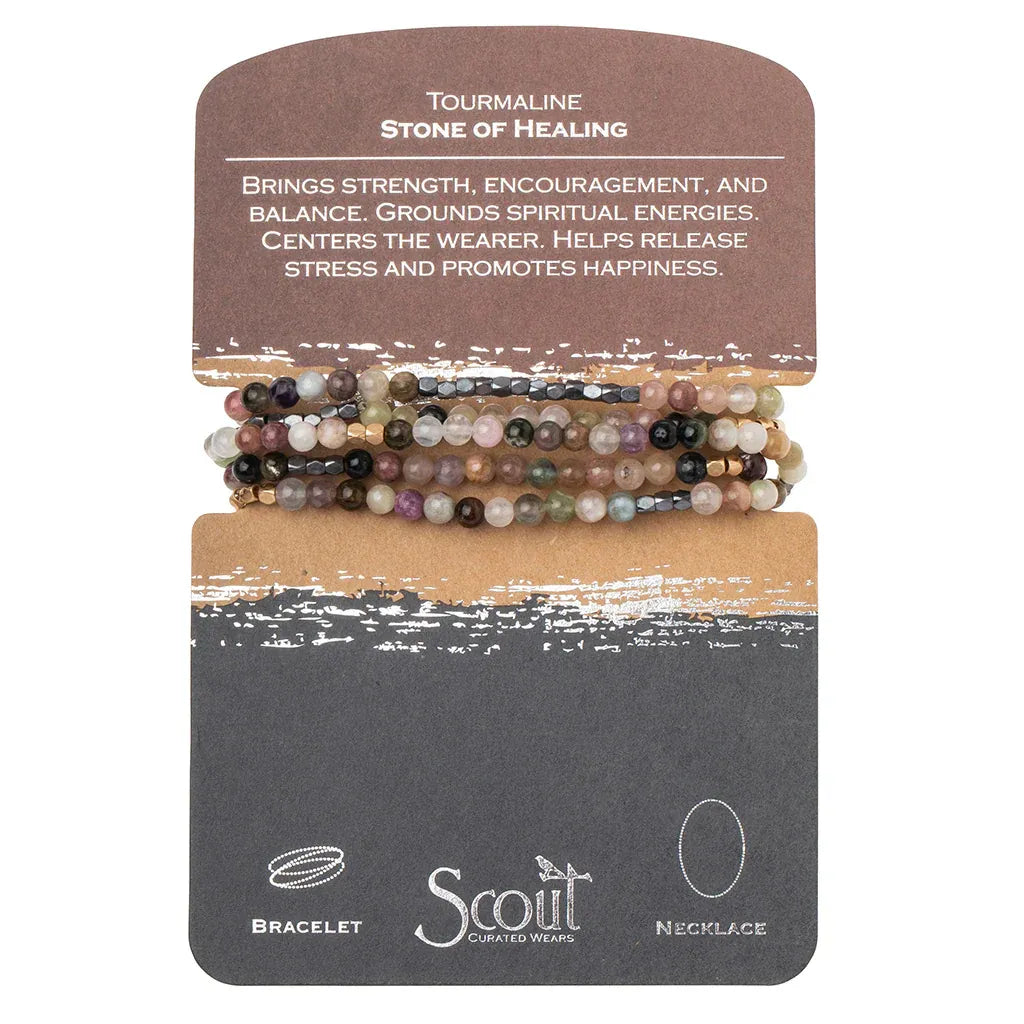 Natural gemstone stone wrap bracelet with earthy tourmaline beads and metallic accents on branded display card