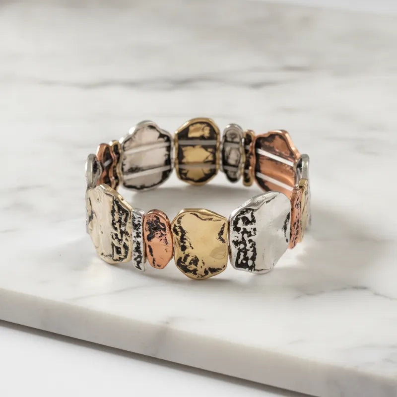 Luxury tri-tone textured pebble link bracelet with hammered silver gold and rose gold irregular metal segments