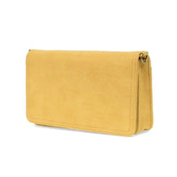 A mustard-yellow suede billie mini organizer crossbody bag with minimalist design and gold-tone hardware