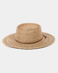 Natural straw palm leaf beach hat with wide brim and woven texture ideal for sun protection at the beach