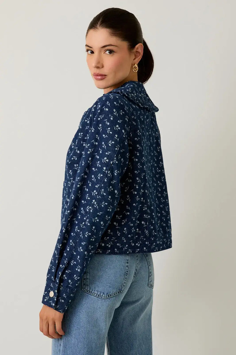 Navy blue floral collar pockets denim jacket with white pattern and long sleeves