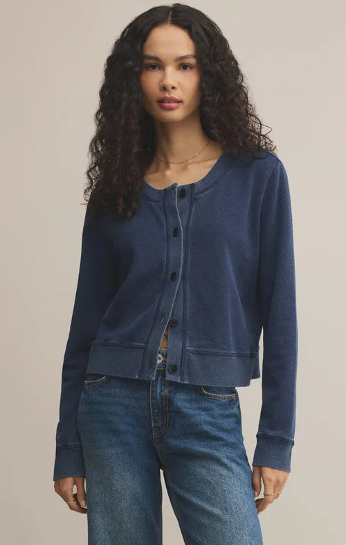 A navy blue daily knit denim cardigan with button-front closure and ribbed cuffs in a cropped design