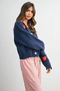 Navy blue heart pattern cropped V neck cardigan with red heart patches