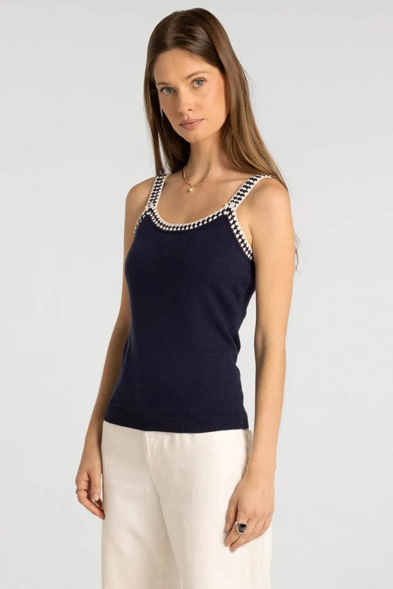 Navy blue knitted brittania tank with white and black checkered trim along neckline and straps by supply brittania