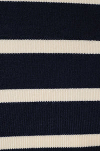 Navy blue and off-white ribbed knit fabric of a round neck short sleeve striped top showing front detail