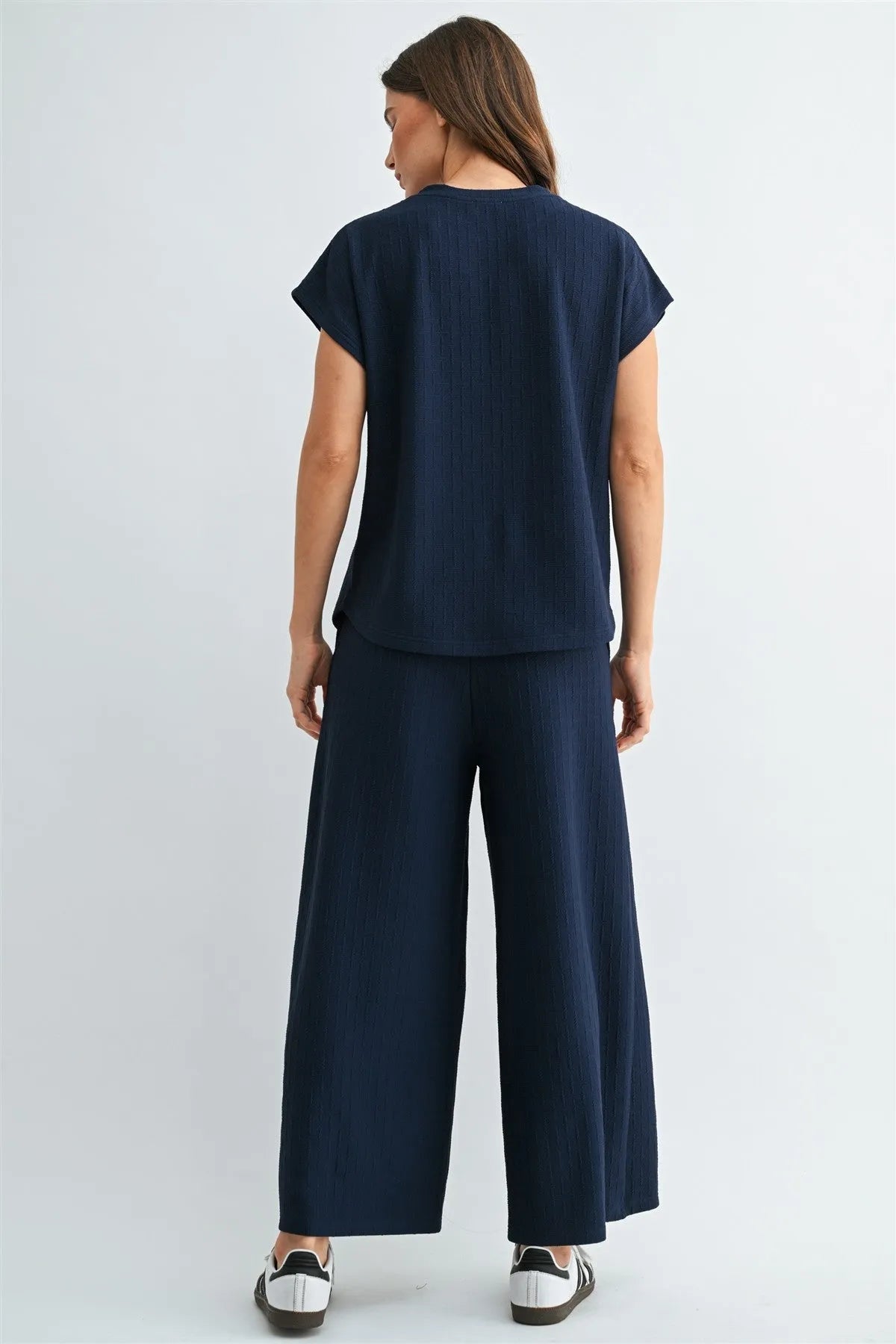 Navy blue textured knit elastic waist two-piece set with short sleeves top and wide-leg pants