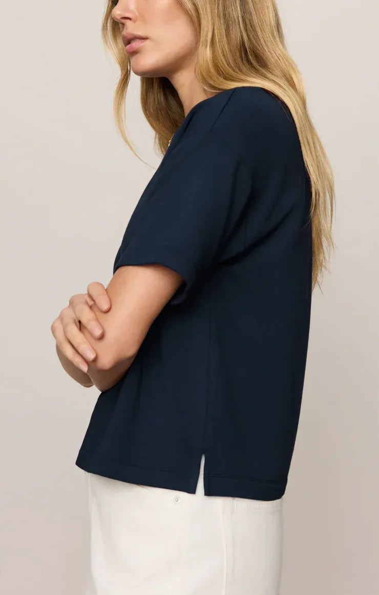 Navy blue short-sleeved harbor modal tee with soft flowing fabric and subtle side slit made from modal material