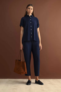 Navy blue short sleeve button down shirt with rolled cuffs and collar perfect for casual and office wear