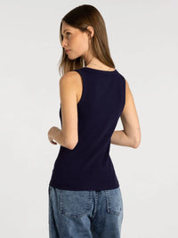 Navy blue sleeveless knit top made of soft fabric in the thread and supply edlin basic tank collection