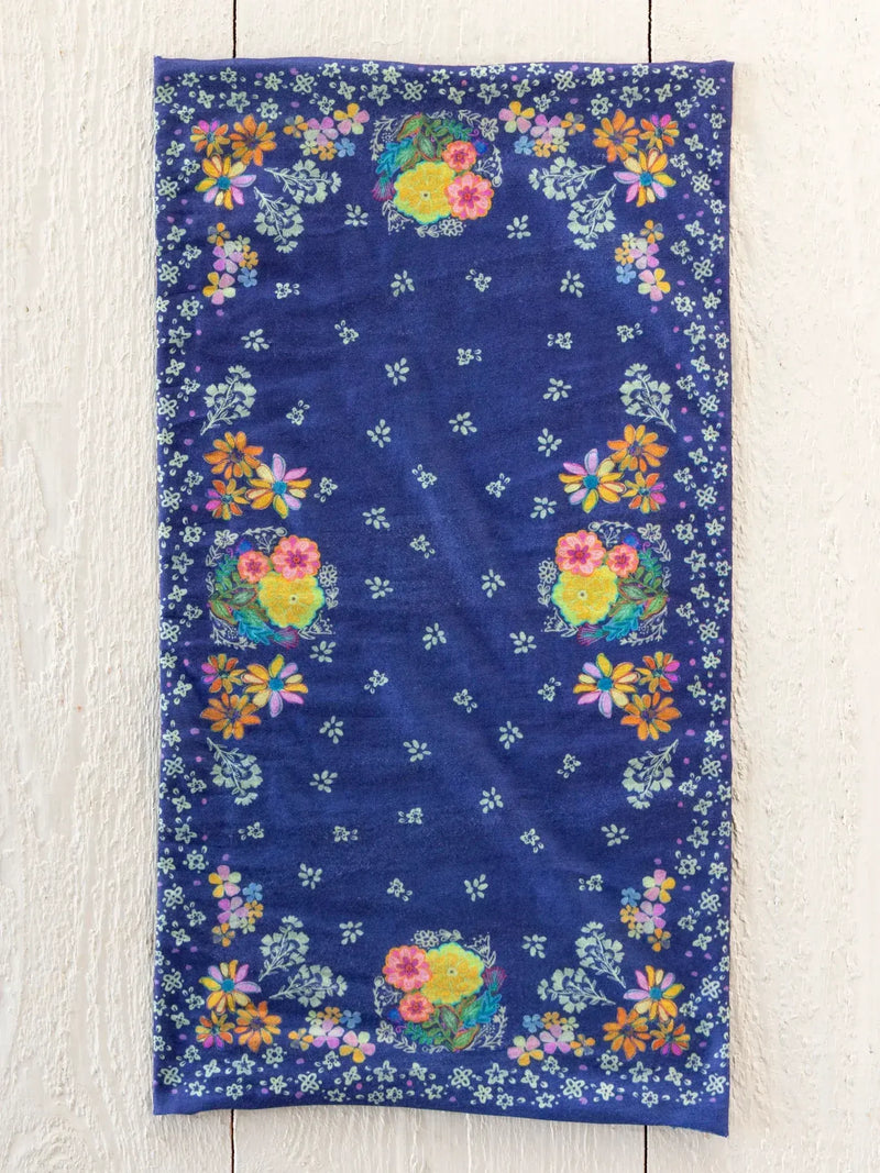 A navy blue full boho bandeau headband with vibrant yellow, pink, orange, and white floral patterns tropic bandana navy