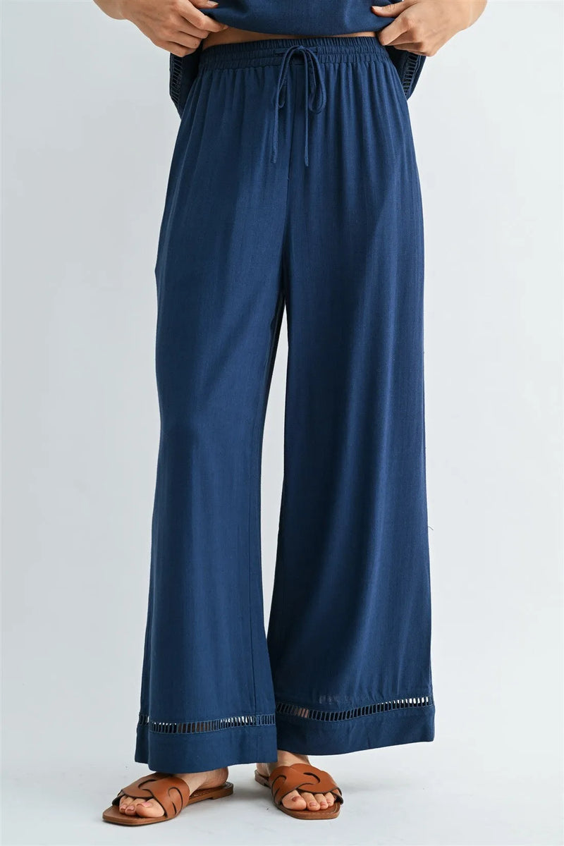 Navy blue wide-leg drawstring trim pants with fringe hem for women’s boho chic clothing shop daisy collection
