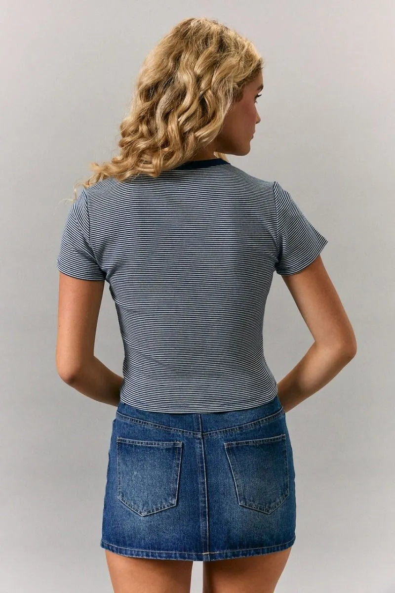 A navy and white striped short sleeve round neck crop top with a black ribbed crew neckline