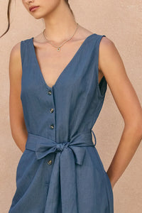 Ocean current button sleeveless blue linen jumpsuit with v-neck front button closure and self-tie waist belt