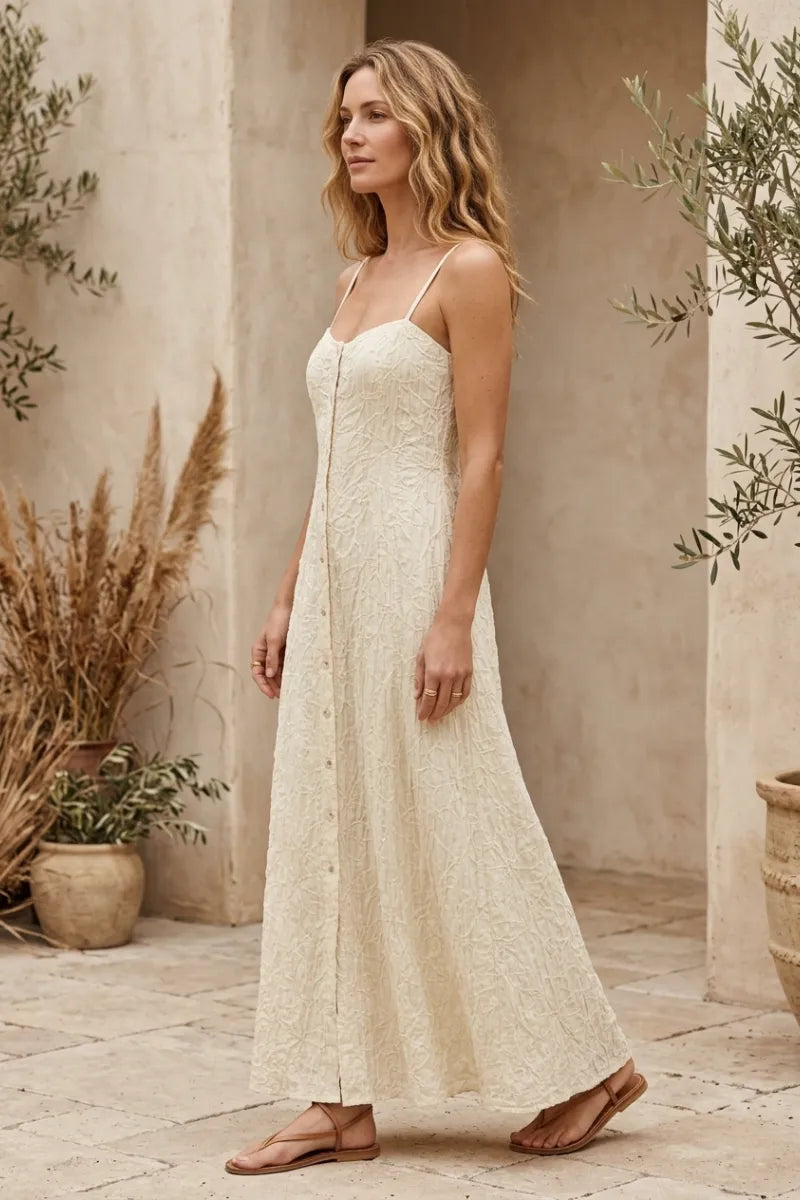 Angel eyes textured off-white lace midi dress with delicate embroidery and thin spaghetti straps