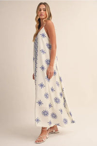 Border printed flowy sleeveless maxi dress with blue snowflake embroidery