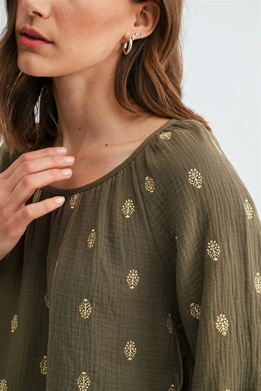 Olive green embroidered gauze 3/4 sleeve blouse with delicate gold floral patterns in women’s boho chic clothing by shop daisy