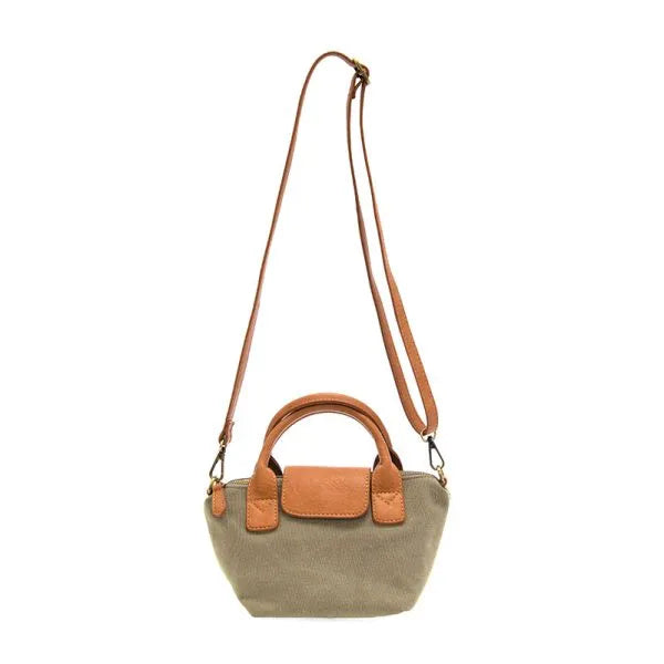 Olive green abilene canvas mini tote crossbody with tan leather handles and adjustable shoulder strap made of canvas