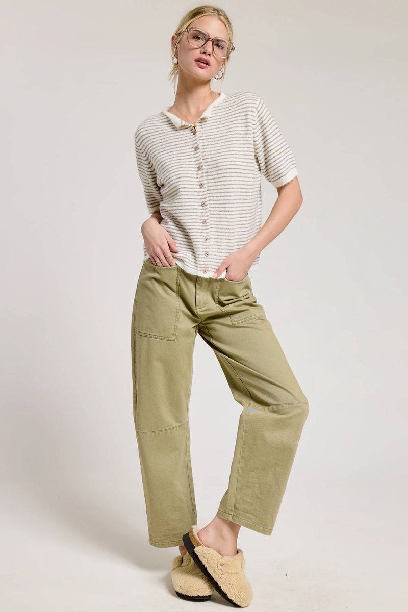Olive green cargo pants with two front pockets and relaxed fit paired with striped short sleeve button cardigan