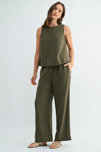Olive green ribbed linen sleeveless top with matching elastic waist tie wide-leg pants for comfortable wear