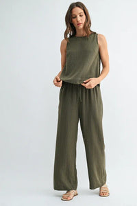 Back view of olive green ribbed stripe button sleeveless top with matching wide-leg pants in women’s boho chic clothing from shop daisy