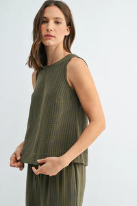 Olive green ribbed sleeveless top with stripe button back detail featuring subtle vertical texture for women’s boho chic clothing