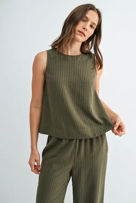 Olive green ribbed sleeveless top with relaxed tiered hemline and stripe button back from shop Daisy women’s boho chic clothing