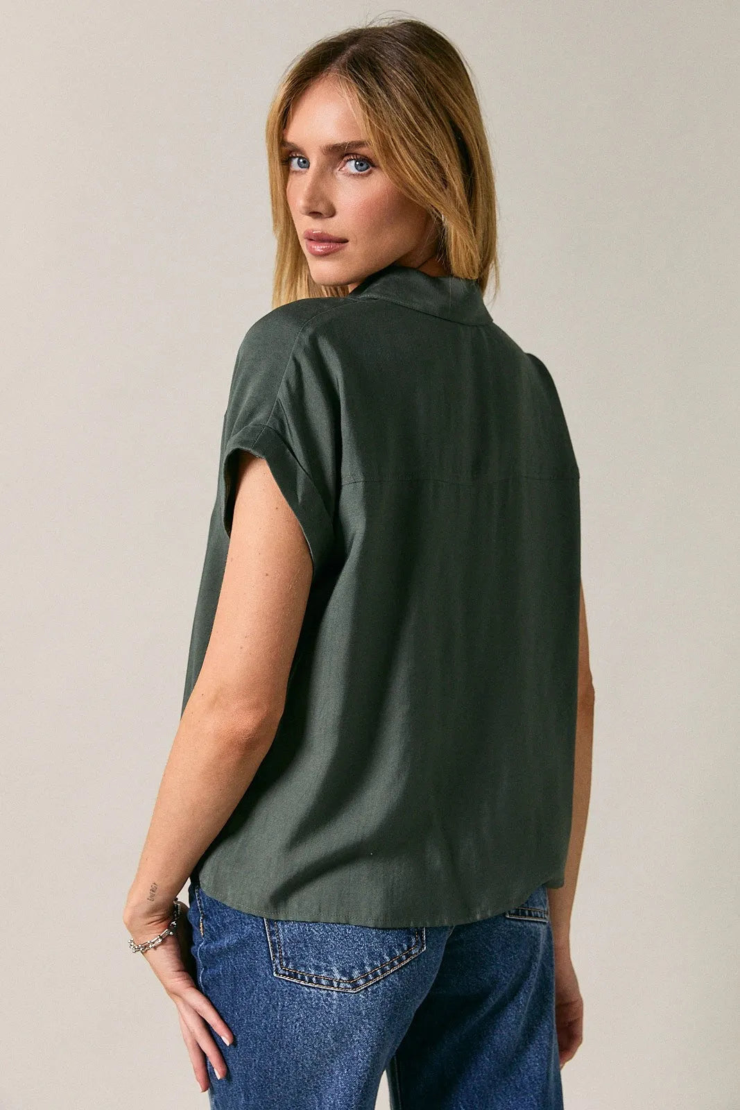 Olive green satin collard wide shoulder button down shirt with short sleeves and collar for elegant wear