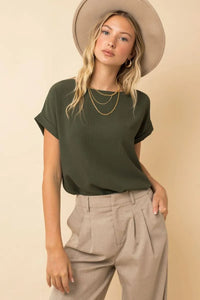 Olive green short roll up sleeve top with relaxed fit and subtle texture featured in women’s boho chic clothing shop daisy