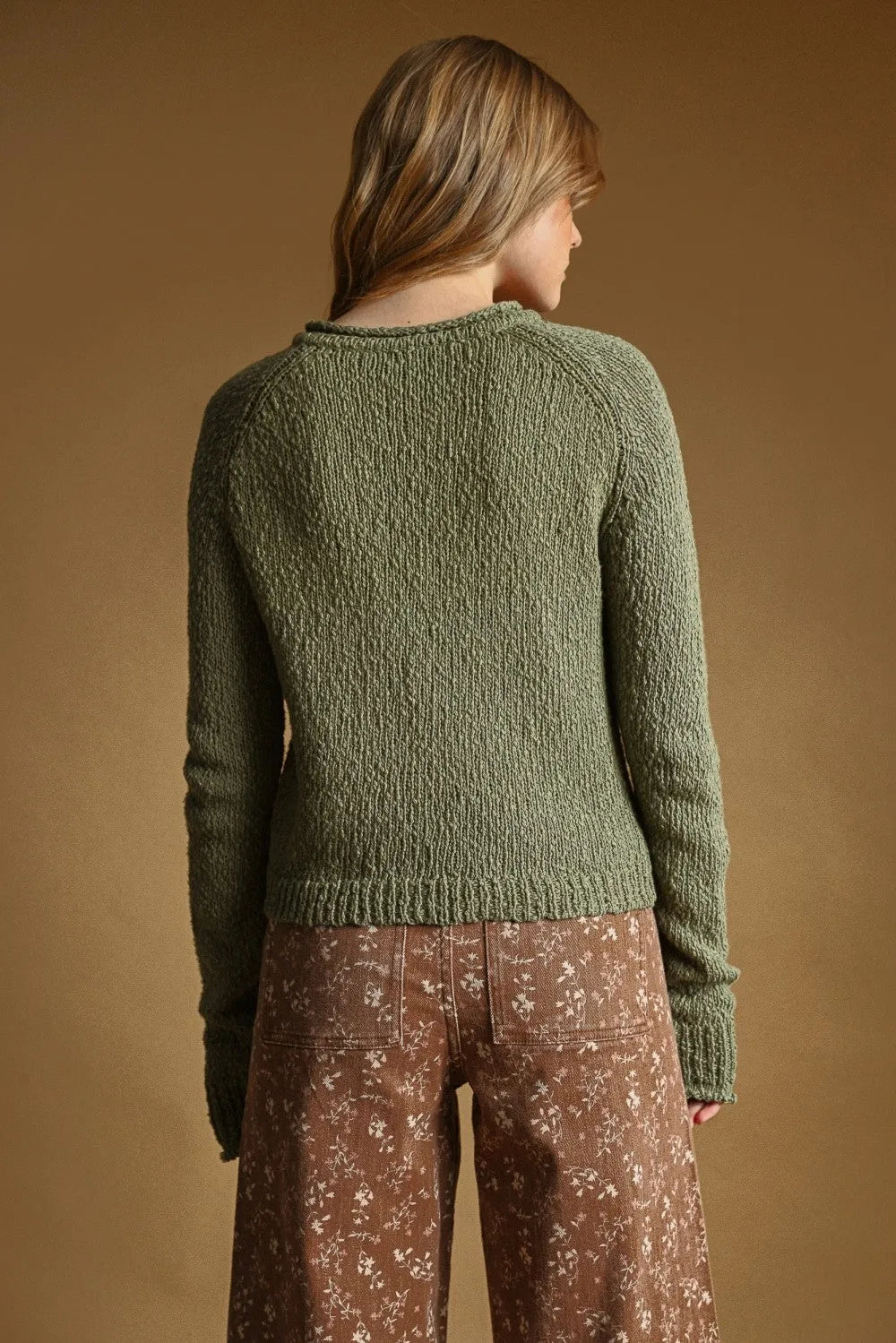 Olive green textured button front sweater knit cardigan made of knit material for stylish layering and warmth
