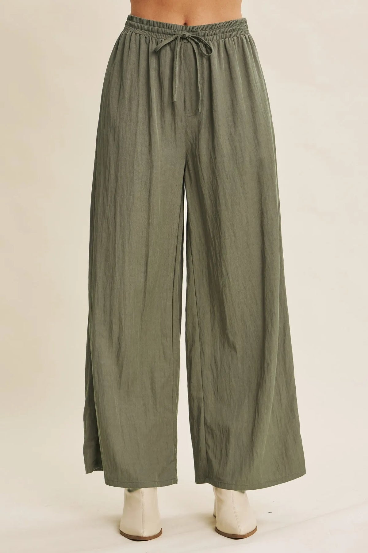 Olive green step washed wide leg pants with elastic waistband and drawstring for comfortable wear