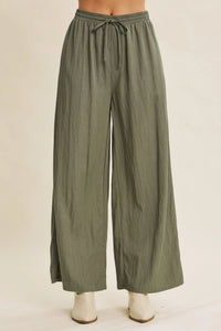 Olive green step washed wide leg pants with elastic waistband and drawstring for comfortable wear