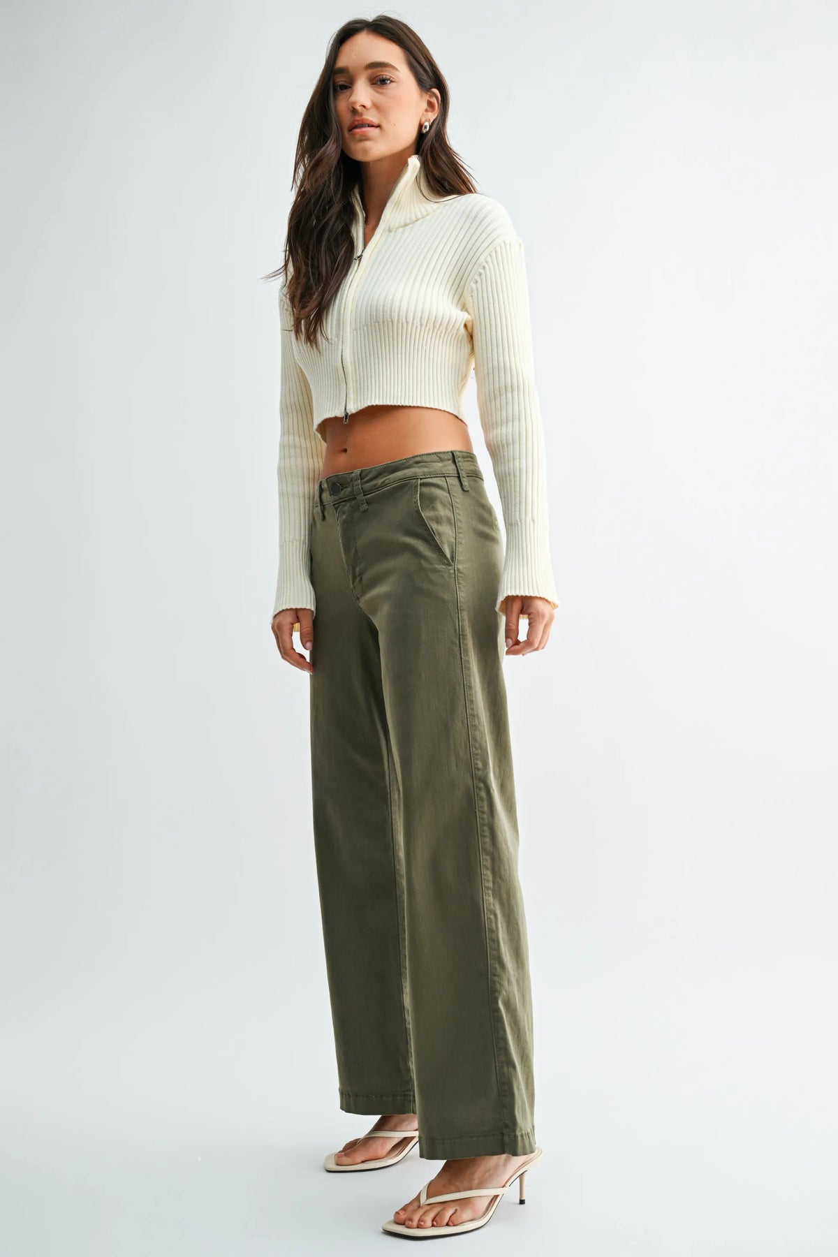 Olive green mid rise stretch twill straight leg trousers with wide-leg cut and visible side seam detailing