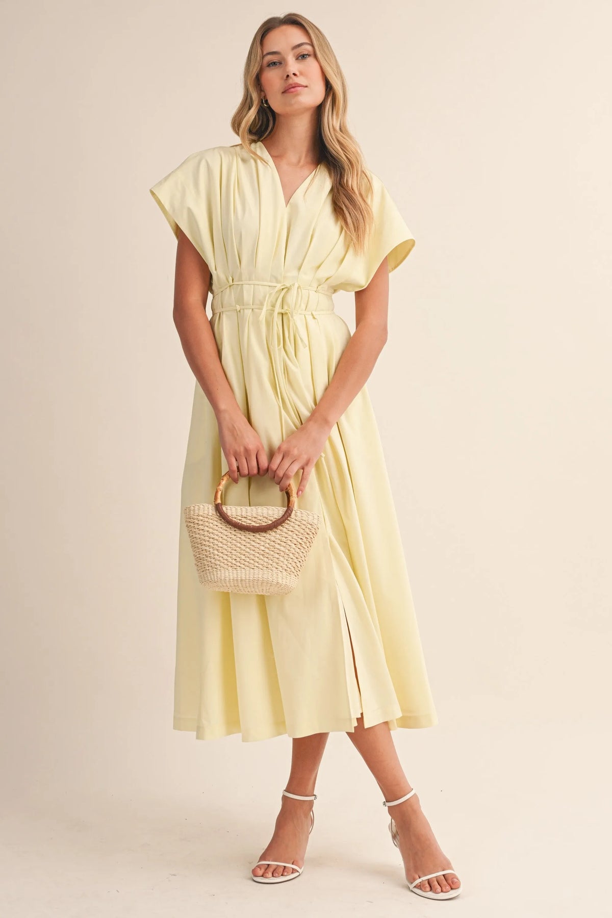 Pale yellow poplin short sleeve belted maxi dress with v-neckline and flutter sleeves mid-calf length