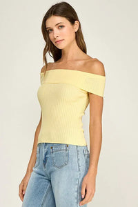 A pale yellow off shoulder ribbed fitted top with a slim silhouette and ribbed texture