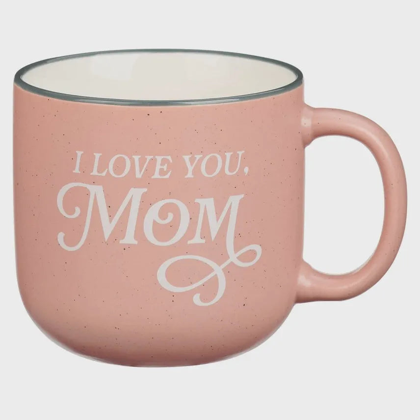 A pink speckled ceramic mug with white interior and handle featuring i love you mom script, ideal for womens boho clothes fans