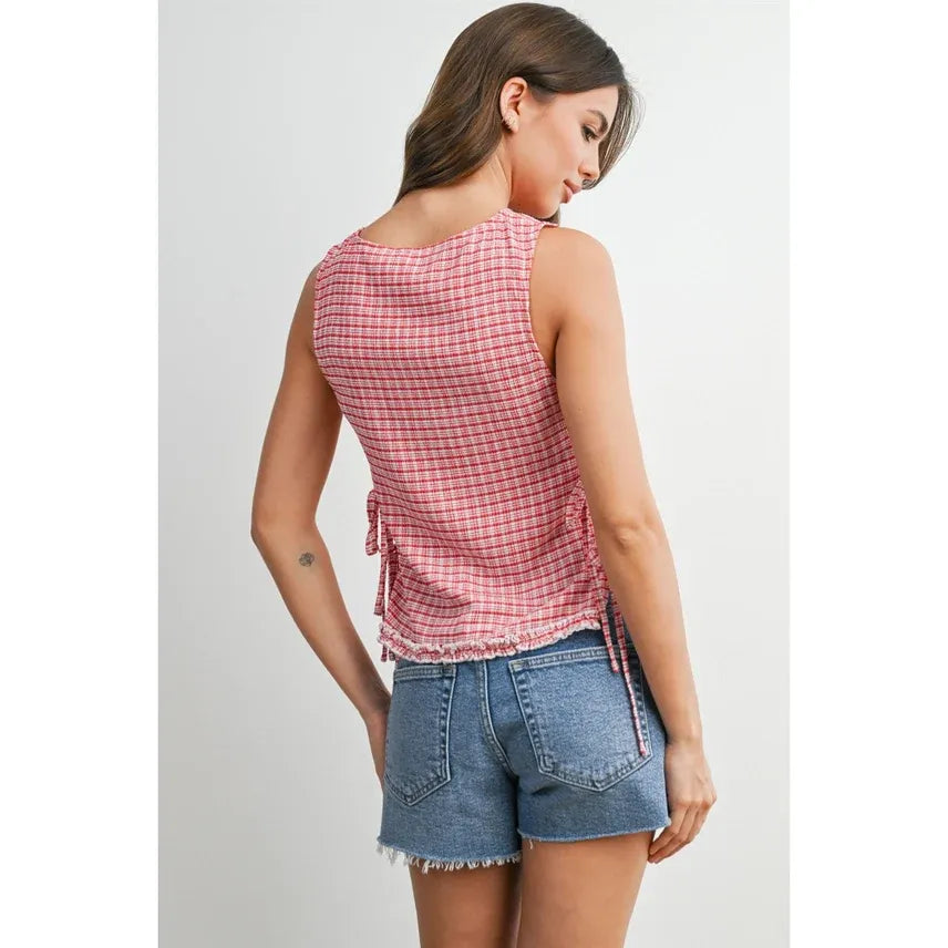 Pink and white sleeveless checkered ladder lace blouse with frayed hem and side ties for casual wear