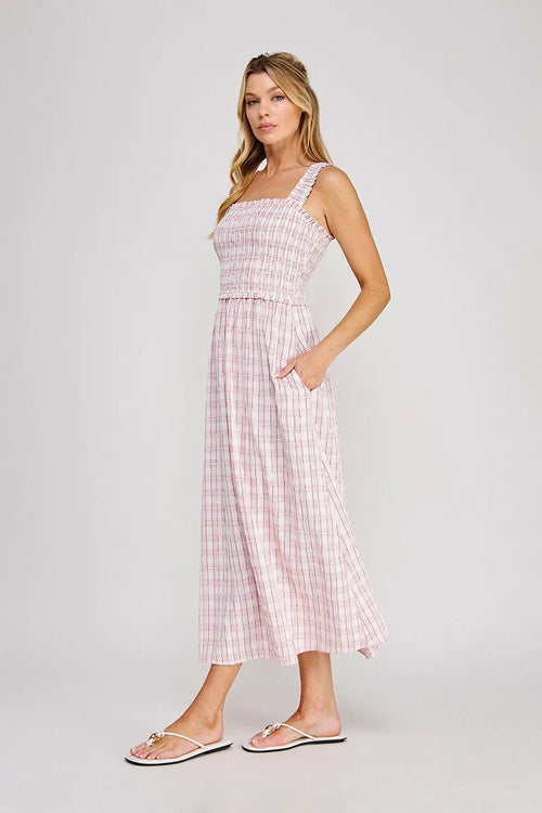 Pink and white plaid print smocked midi dress with square neckline smocked bodice and side pockets