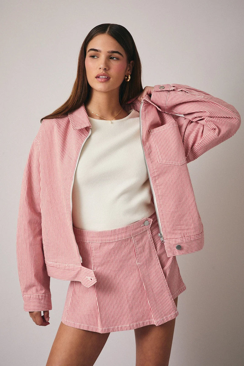 Pink and white stripe twill zip bomber jacket with zipper front and buttoned cuffs