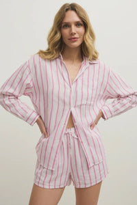 Pink and white perfect linen striped pajama set with loose button-up top and matching shorts in linen striped fabric